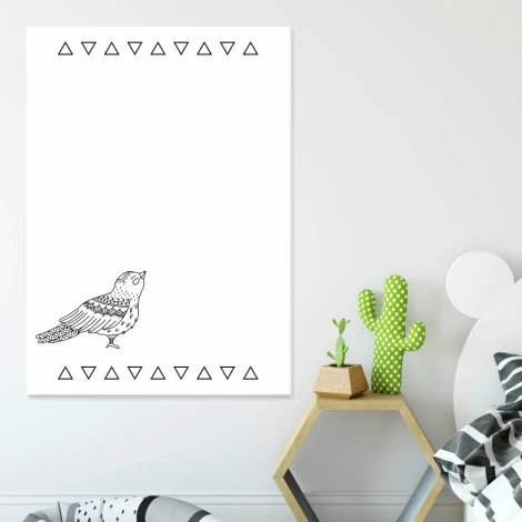 Dry-erase magnetic board for kids with a bird design on a white background.
