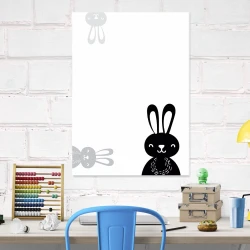 Dry-erase magnetic board for kids featuring two bunnies on a white background.