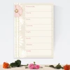 Weekly planner magnetic whiteboard with floral design and horizontal lines.