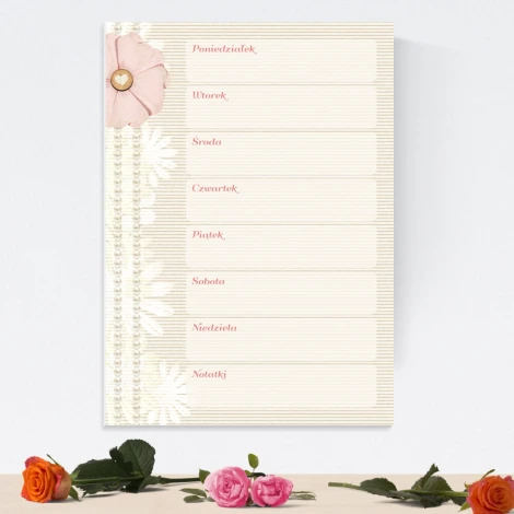 Weekly planner magnetic whiteboard with floral design and horizontal lines.