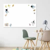 Magnetic dry-erase board for kids featuring a space theme with astronaut illustrations on a white background.