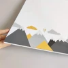 Dry-erase magnetic board for kids featuring animals and mountains design in shades.
