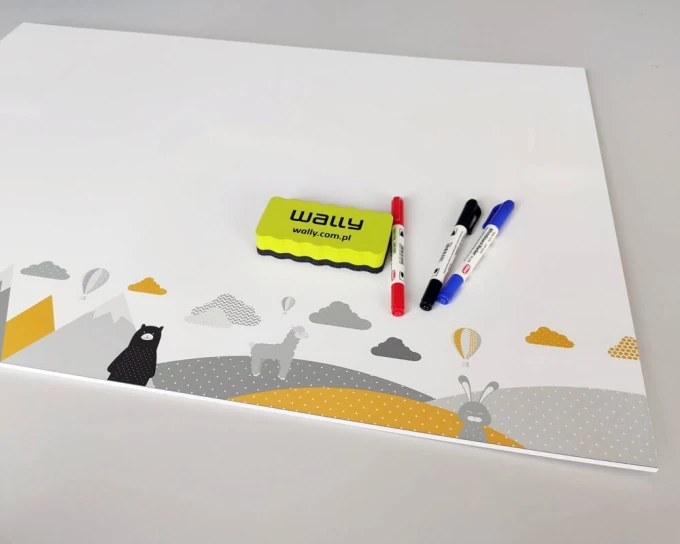 Magnetic dry-erase board for kids featuring animals and mountains, with clouds and mountains in the design.
