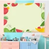 Magnetic dry-erase board for the kitchen featuring a graphic design of fruits and vegetables.