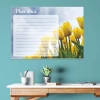 Magnetic dry-erase board daily planner with tulips design, ideal for office decor. Blue walls and light furniture.