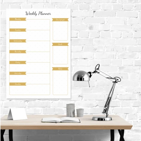 Magnetic dry-erase weekly planner 407 - Office setup with white walls, wooden table, and metal lamp.