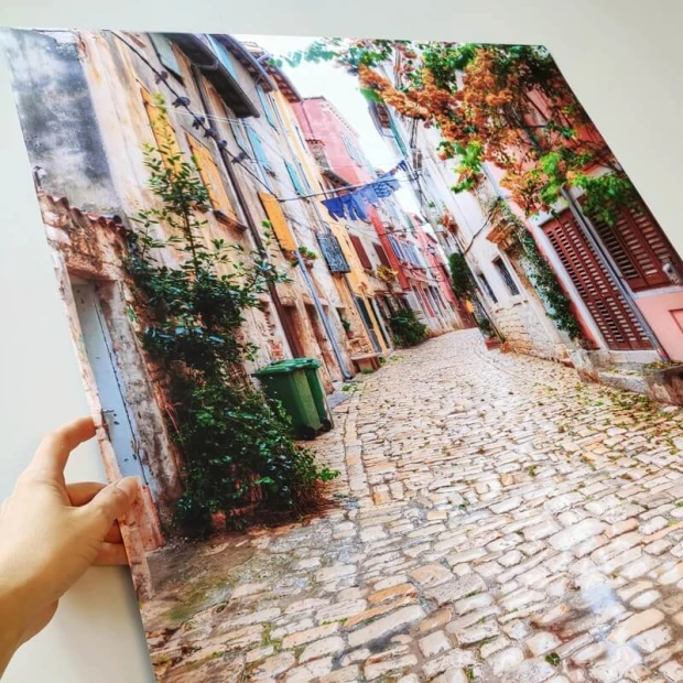 Photo poster 30x40 cm - Street arrangement with old tenements, colorful facades, and cobblestone road.