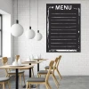Chalkboard menu 001 - Café decor with white walls, wooden furniture, and a table with chairs.