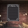 Chalkboard menu 002 - Restaurant decor with dark brick and wooden furniture.