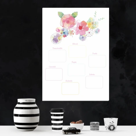 Weekly planner magnetic whiteboard with colorful flowers on a white background.