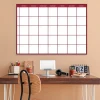 Magnetic dry-erase weekly planner in English, ideal for office decor. Brown walls and table.