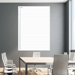 Dry-erase magnetic monthly planner board 371 - Office setup with gray walls and a wooden table.