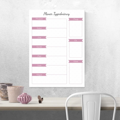 Weekly planner whiteboard with a graphic design. White background with pink stripes and sections.