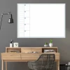 Weekly planner dry-erase magnetic board 506 - Office setup with gray-beige walls and wooden accents.