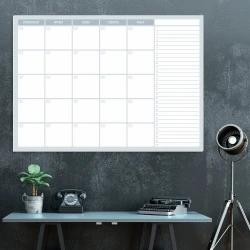 Weekly planner dry-erase magnetic board 511 - Office setup with dark walls and a table with a lamp.