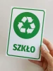Recycling bin sign for glass - Graphic design. Green recycling symbol with "GLASS" text on a white background.