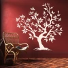 Sticker 03X 22 tree 1933 - Living room arrangement. Dark red wall with white tree and wicker chair.