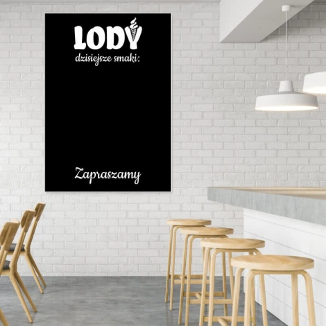 Chalkboard ice cream display 056 - Café setup with white walls, wooden chairs, and a light table.