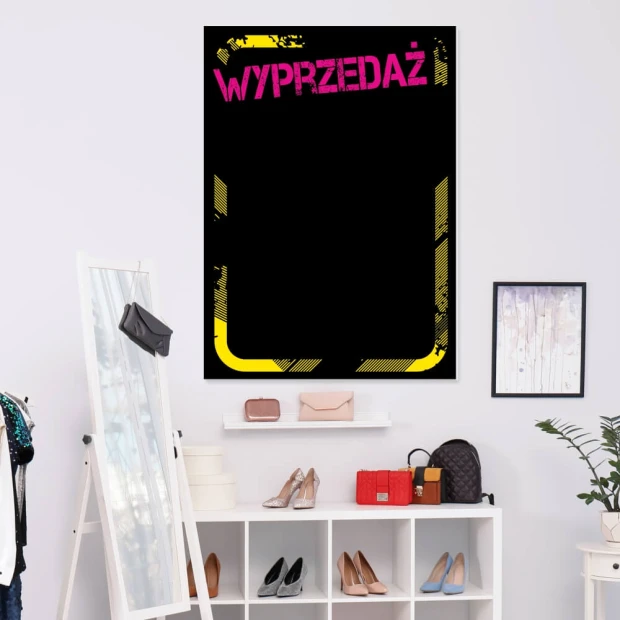 Chalkboard sale 060 - Store display with light-colored walls and minimalist furniture.