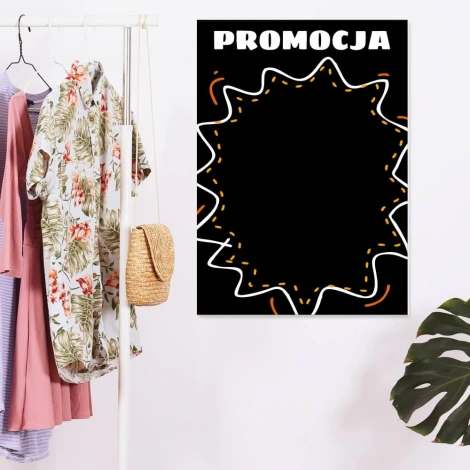 Chalkboard with print promotion 077 - Styled in a modern interior with light-colored walls and pastel clothing.
