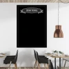 Chalkboard menu board 042 - Restaurant decor with light-colored walls, wooden furniture, and metal lamps.