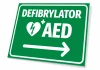 AED Defibrillator T560 Sign - Graphic design. Green background, white text, heart symbol with lightning, right arrow.