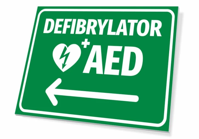 AED Defibrillator T561 - Graphic design with green background, white text, heart symbol, and left arrow.