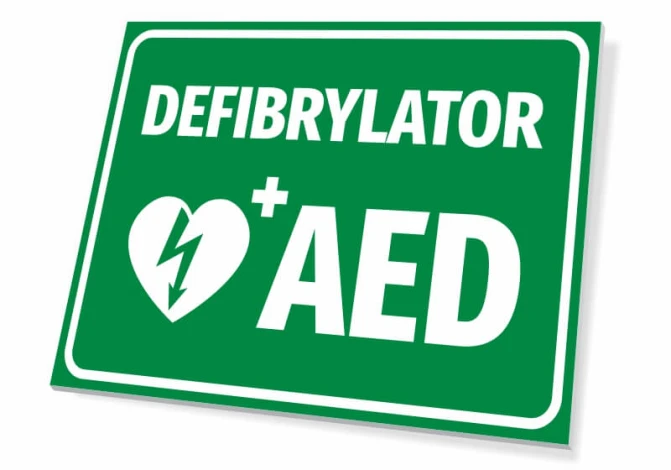 AED Defibrillator T562 - Graphic design with a green background, white text, and a heart symbol with a lightning bolt.