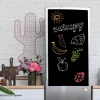 Custom chalkboard sticker for fridge - Kitchen decor with light walls, wooden accents, and plants.