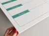 Weekly planner dry-erase board 407 - Features green stripes with days of the week on a white background.