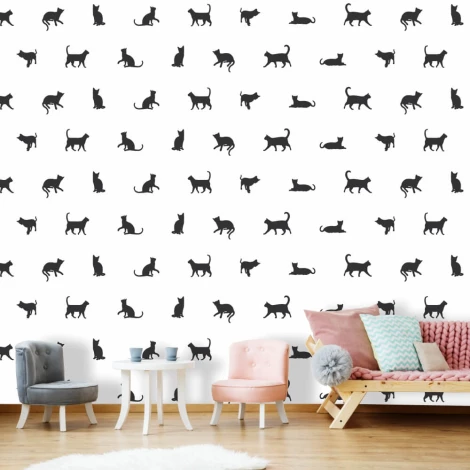 Kids\' room wallpaper with black cat silhouettes on a white background in a regular pattern.