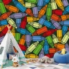 Colorful crayon wallpaper for kids\' room - designed for a playful and vibrant atmosphere with dark-colored walls.
