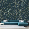Living room wallpaper branches 014 - Dark walls, blue sofa, and light cushions in the arrangement.