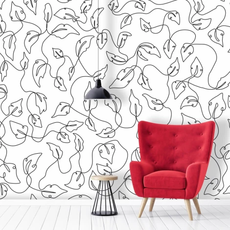 Leaf wallpaper 053 - Living room setup with light walls, a red armchair, and a black lamp.