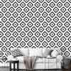 Scandinavian wallpaper design 042 - Graphic pattern with black and white diamonds in a regular layout.