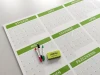 Universal dry-erase yearly calendar 459 - Simple monthly layout with green headers and gray accents.