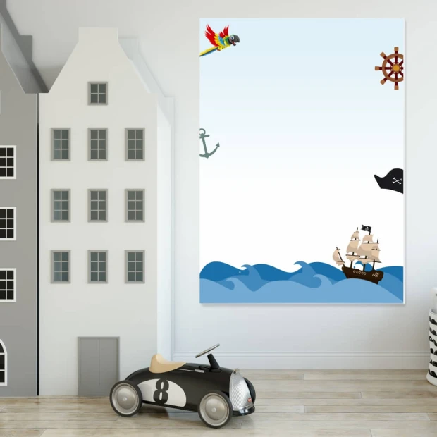 Magnetic dry-erase board for kids featuring a pirate ship design with waves, a pirate, and a steering wheel.