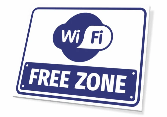 WiFi Free Zone Sign - Graphic design with a round WiFi symbol on a blue background and FREE ZONE in bold letters.
