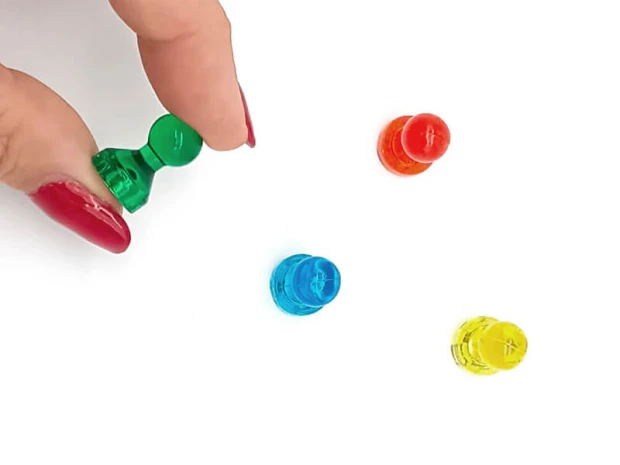 Neodymium push pins, 6 pieces - Graphic design. Transparent magnets in various colors on a white background.