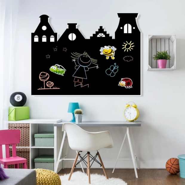 Chalkboard magnetic board for kids\' rooms with bright walls and assorted furniture.
