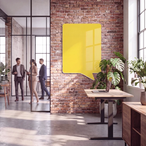Magnetic whiteboard for office use, featuring a gray-themed decor and modern furniture.