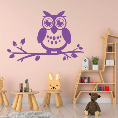 Charming owl sticker on a branch, perfect for a child\'s room, in pastel colors, adds a whimsical touch.