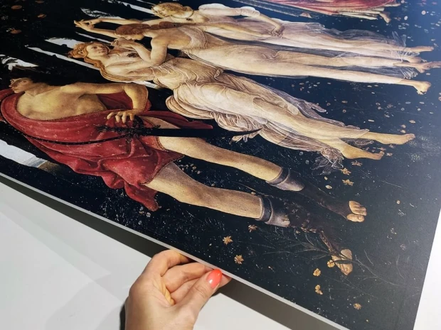 Reproduction of Primavera by Sandro Botticelli - Graphic design featuring figures in motion, surrounded by flowers and trees.