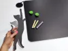Magnetic chalkboard for kids featuring a black cat with a raised paw on a dark background.