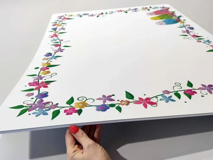 Magnetic whiteboard for kids with colorful birds design on a white background.