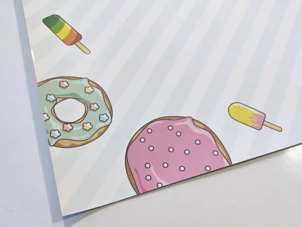 Dry-erase magnetic board for kids featuring a unicorn design with horizontal stripes and illustrations.