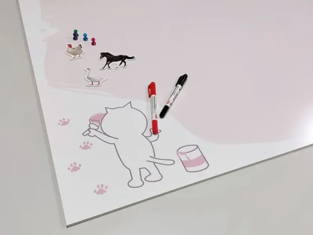 Dry-erase magnetic board for kids featuring a cat design with an outline of a cat painting.