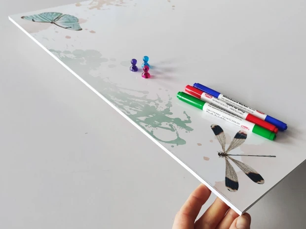 Magnetic whiteboard for kids with butterfly design on a white background featuring various butterflies.