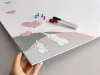 Dry-erase magnetic board for kids featuring elephants holding heart-shaped balloons.