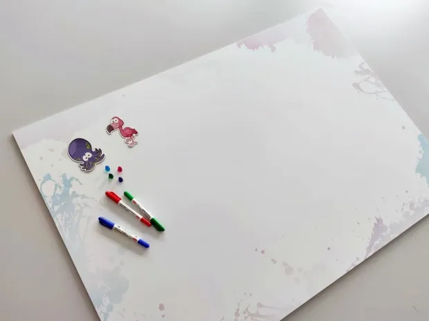 Dry-erase magnetic board for kids, watercolor design with colorful splashes on a white background.